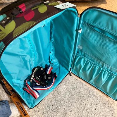 Lot 49 Fancy roller suit case