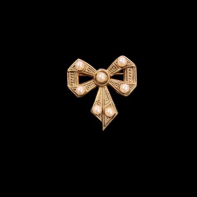 Sale Photo Thumbnail #122: Set of Four Gold Toned Brooches