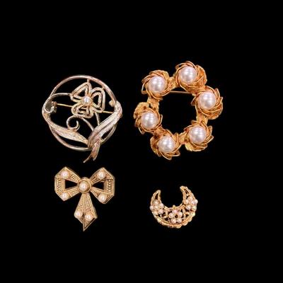 Sale Photo Thumbnail #123: Set of Four Gold Toned Brooches