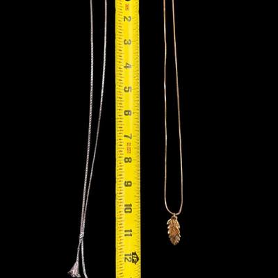 Sale Photo Thumbnail #132: Silver Toned and Gold Toned Necklaces