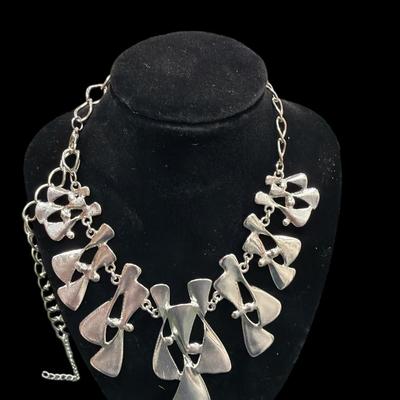 Sale Photo Thumbnail #150: Set of Three Vintage Women's Fashion Silver Toned Necklaces