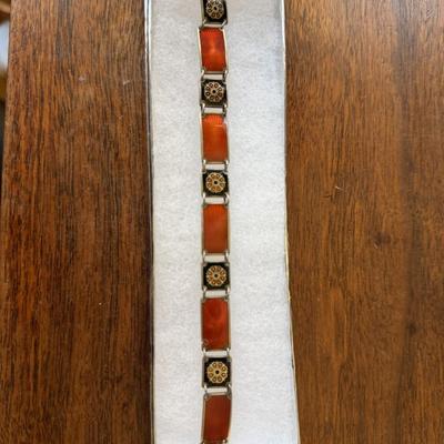 Sale Photo Thumbnail #242: Vintage, guilloche red and black enamel panel bracelet. 
7 inches long closed.