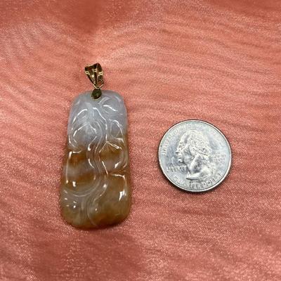 Sale Photo Thumbnail #245: The chain is 18 inches, the pendant  is bi-color  red/orange and white jadeite.