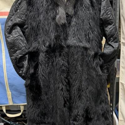 Sale Photo Thumbnail #249: This is an amazing coat.  Photo 1 shows the coat with the acetate trenchcoat with the genuine fur lining showing at the collar and front.
Photo 2 shows the coat reversed, with the vest and quilted sleeves.  It also shows the lining as it could be detached