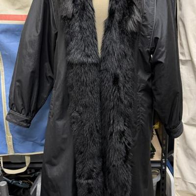 Sale Photo Thumbnail #248: This is an amazing coat.  Photo 1 shows the coat with the acetate trenchcoat with the genuine fur lining showing at the collar and front.
Photo 2 shows the coat reversed, with the vest and quilted sleeves.  It also shows the lining as it could be detached