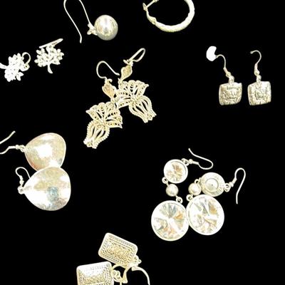 Sale Photo Thumbnail #192: Assortment Of Silver Toned Earrings