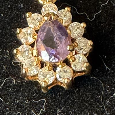 Sale Photo Thumbnail #253: Lovely amethyst stone set in 14K yellow gold, with tourmaline crystals around the amethyst.
10K gold 18 inch chain