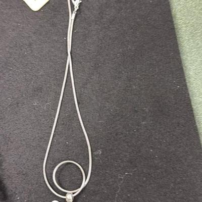 Sale Photo Thumbnail #234: Set of 4 Silver Toned Necklaces