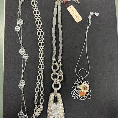 Sale Photo Thumbnail #235: Set of 4 Silver Toned Necklaces