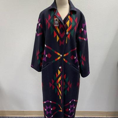 Sale Photo Thumbnail #262: #450 of 1000, Native Jackets, Sante Fe, N. Mex.
100% Acetate
Full length coat , blanket coat
2 side pockets, back slit
This is a stunning coat !
Size Medium, excellent condition, 1 previous owner