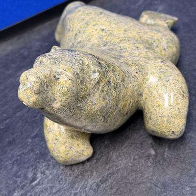 Sale Photo Thumbnail #270: This is a very special piece, created by Oqituqshaa.  It is a celebrated and iconic subject in Inuit art, representing harmony 
with  nature or a spiritual transformation.  The pose, with the head held high and limbs akimbo, captures a sense of movement, 