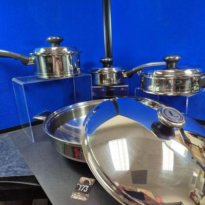 Sale Photo Thumbnail #288: Lifetime has been bought out by West Bend
Included are 3/4 quart , 2 quart saucepans with lids
 8" covered fry pan
15" covered wok style pan
All are in NEW condition