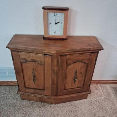 SPRINGFIELD BATTERY OPERATED CLOCK AND A SIDE CABINET