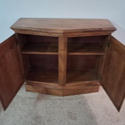 SPRINGFIELD BATTERY OPERATED CLOCK AND A SIDE CABINET