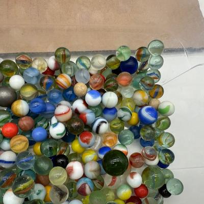 Large Lot of Vintage Glass Marbles – Mixed Colors, Swirls & Shooters in Storage Bin