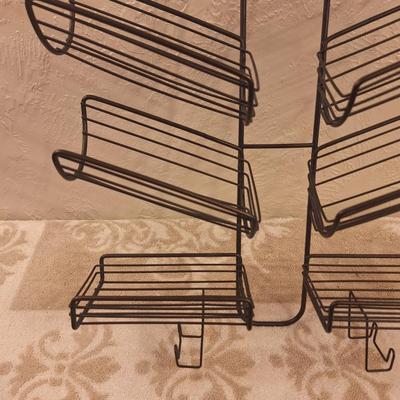 Hanging metal shower caddy in bronze finish