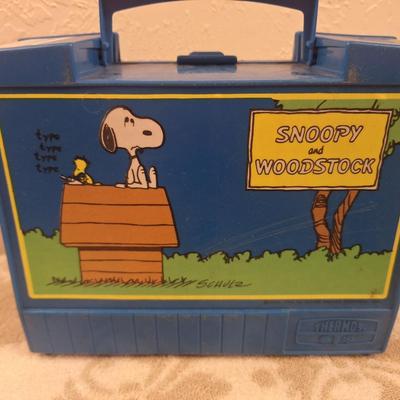 vintage blue plastic Snoopy and Woodstock lunch box by Thermos, originally produced in 1971. 