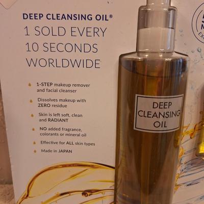 DHC Deep Cleansing Oil 10.1 fl. oz. with a bonus 1 fl. oz. travel size bottle. 