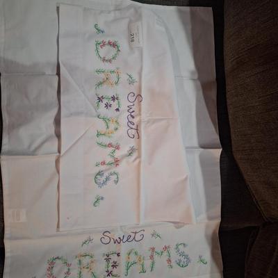  pair of stamped embroidery pillowcases with a "Sweet Dreams" floral design. 