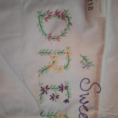  pair of stamped embroidery pillowcases with a "Sweet Dreams" floral design. 