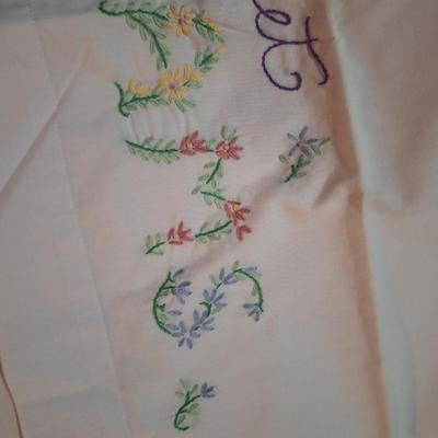  pair of stamped embroidery pillowcases with a "Sweet Dreams" floral design. 