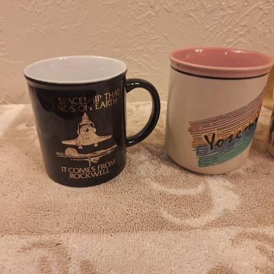 assortment of coffee mugs