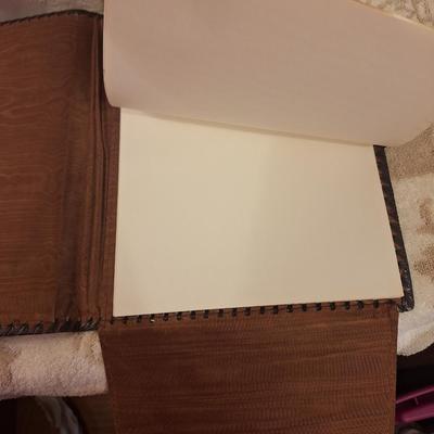 handmade embossed leather journals with a medieval style design. See all photos.