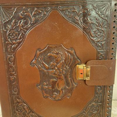 handmade embossed leather journals with a medieval style design. See all photos.