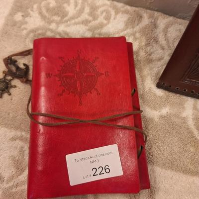 handmade embossed leather journals with a medieval style design. See all photos.