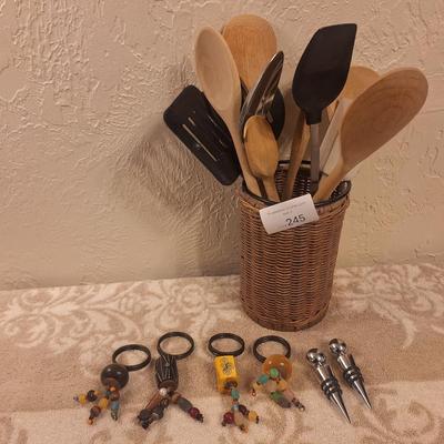 Kitchen utensils in woven basket, pier 1 napkin rings and 2 wine stoppers
