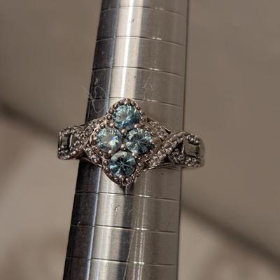 D'Joy sterling silver 925 ring size 7 with sky blue stones and clear accent stones.