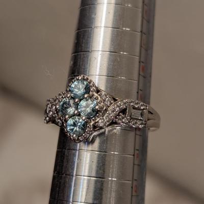 D'Joy sterling silver 925 ring size 7 with sky blue stones and clear accent stones.