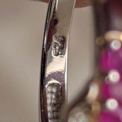 Sterling silver 925 ring size 8 with a large red stone and smaller accent stones