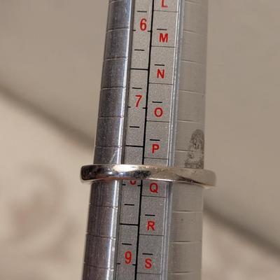 Sterling silver 925 ring size 8 with a large red stone and smaller accent stones