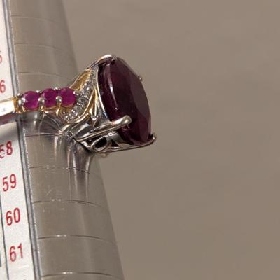 Sterling silver 925 ring size 8 with a large red stone and smaller accent stones