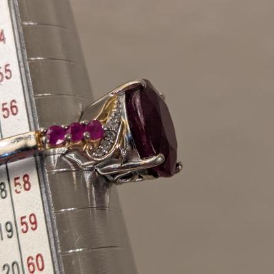 Sterling silver 925 ring size 8 with a large red stone and smaller accent stones