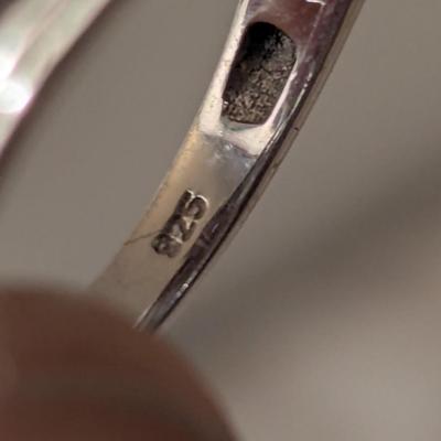 Sterling silver ring size 7 with blue stones maybe blue kyanite? And clear stone accents