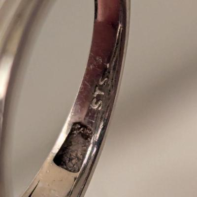 Sterling silver ring size 7 with blue stones maybe blue kyanite? And clear stone accents