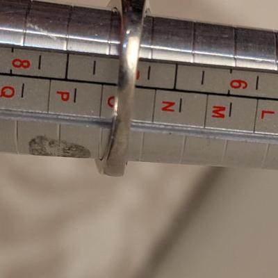 Sterling silver ring size 7 with blue stones maybe blue kyanite? And clear stone accents