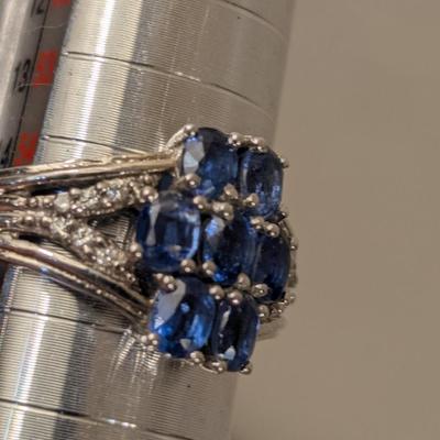 Sterling silver ring size 7 with blue stones maybe blue kyanite? And clear stone accents