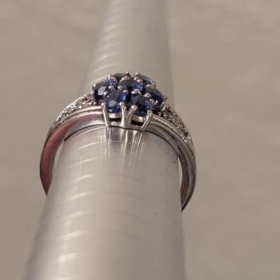 Sterling silver ring size 7 with blue stones maybe blue kyanite? And clear stone accents