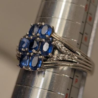 Sterling silver ring size 7 with blue stones maybe blue kyanite? And clear stone accents