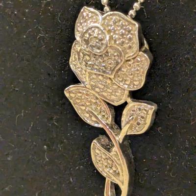 STS sterling silver 925 necklace with Rose pendant (small accent stones unknown if diamonds or other). 18 in chain.