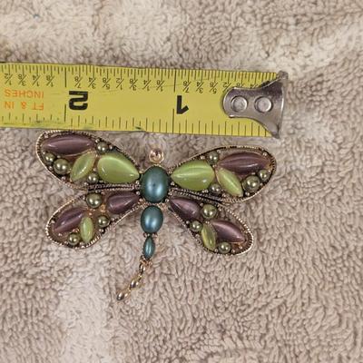 Vintage dragonfly brooch with green and purple moonstone glass and faux pearls