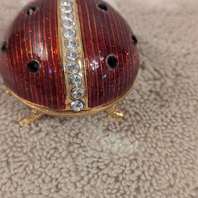 enameled pewter ladybug trinket box with rhinestone accents and storage box for it.