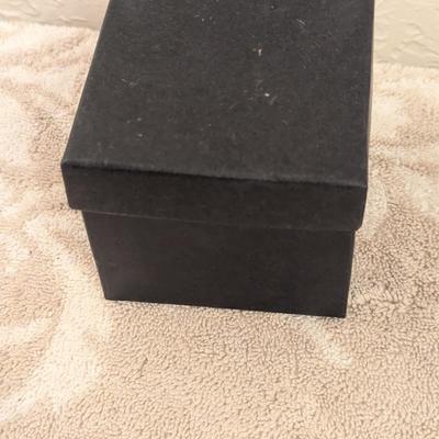 enameled pewter ladybug trinket box with rhinestone accents and storage box for it.