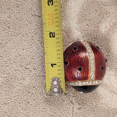 enameled pewter ladybug trinket box with rhinestone accents and storage box for it.