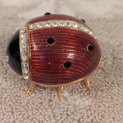 enameled pewter ladybug trinket box with rhinestone accents and storage box for it.