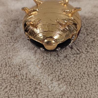 enameled pewter ladybug trinket box with rhinestone accents and storage box for it.