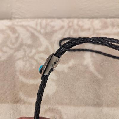 silvertone bear paw bolo with turquoise colored stone